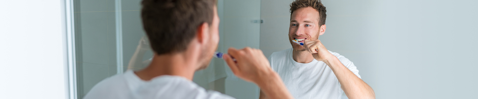 Protect Your Oral Health – Man Brushing
